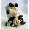 Petite vache en terre cuite